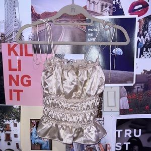 reformation viviana top — champagne colored smocked tank top with tie straps